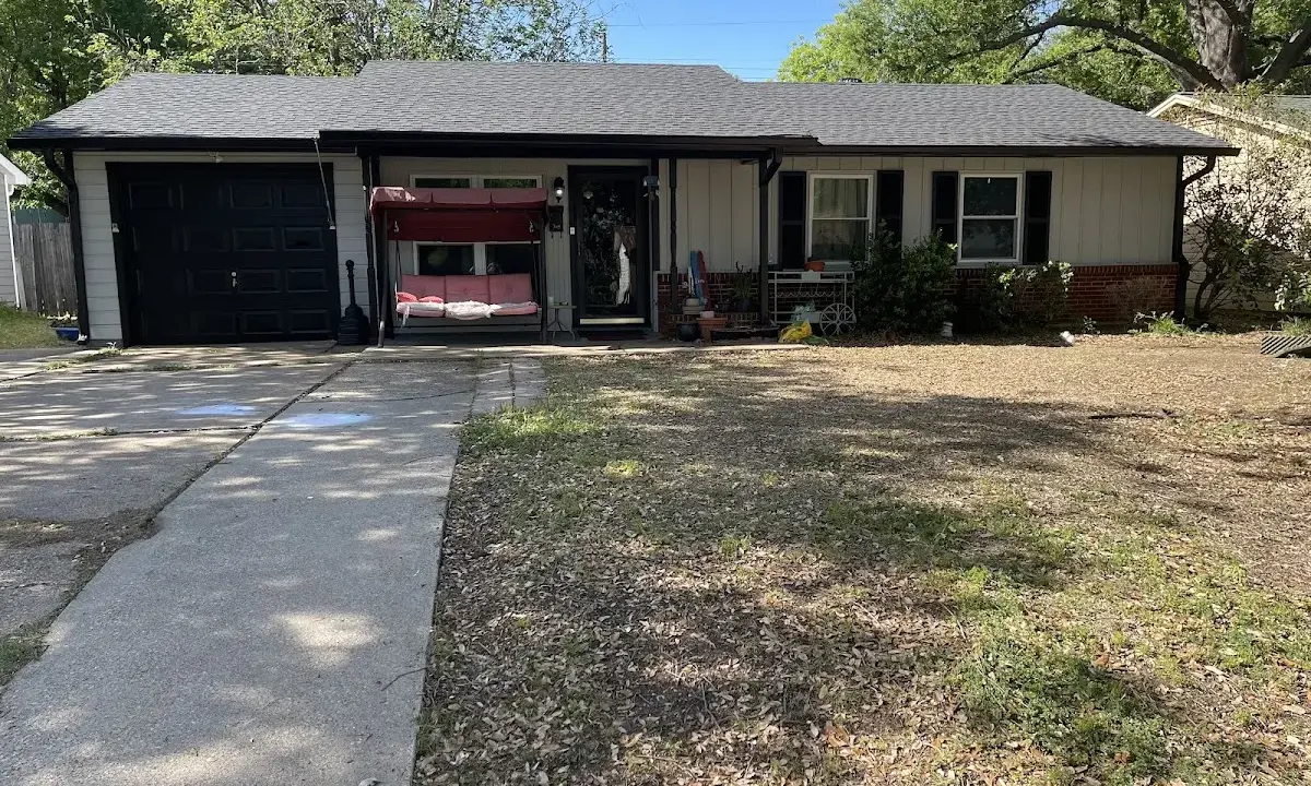 Soffit & Fascia Repair crew at work on a residential roof in Crawfordville